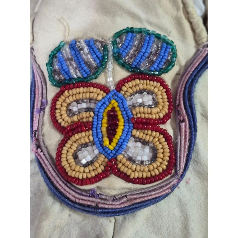 Vintage Crow Beaded Hide Moccasins featuring Intricate Colorful Glass Beadwork